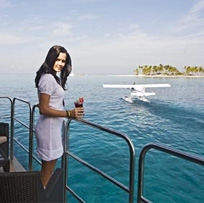 Woman on private balcony on a luxury yacht